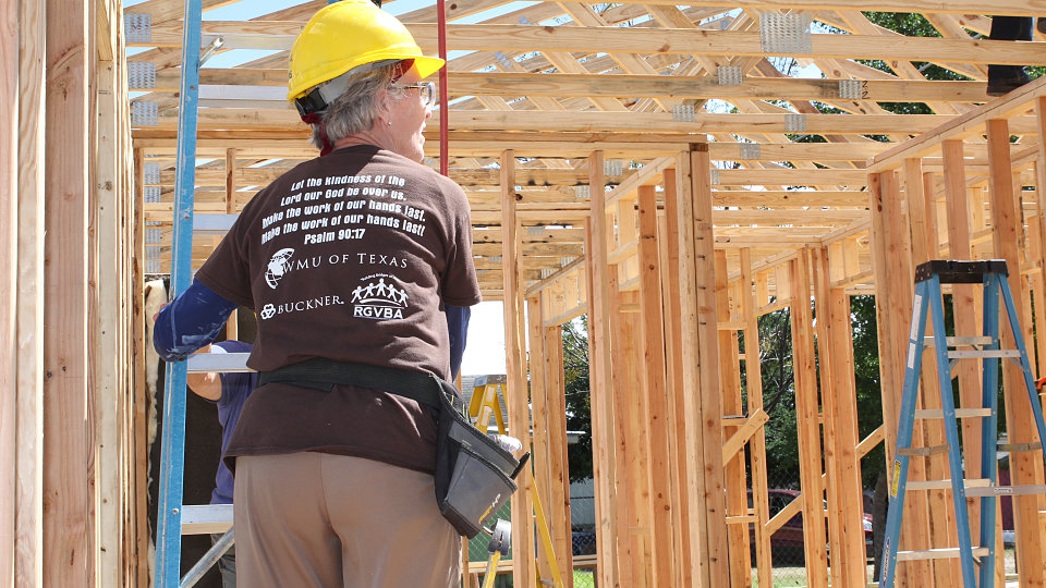 volunteers with wmu build home for buckner family
